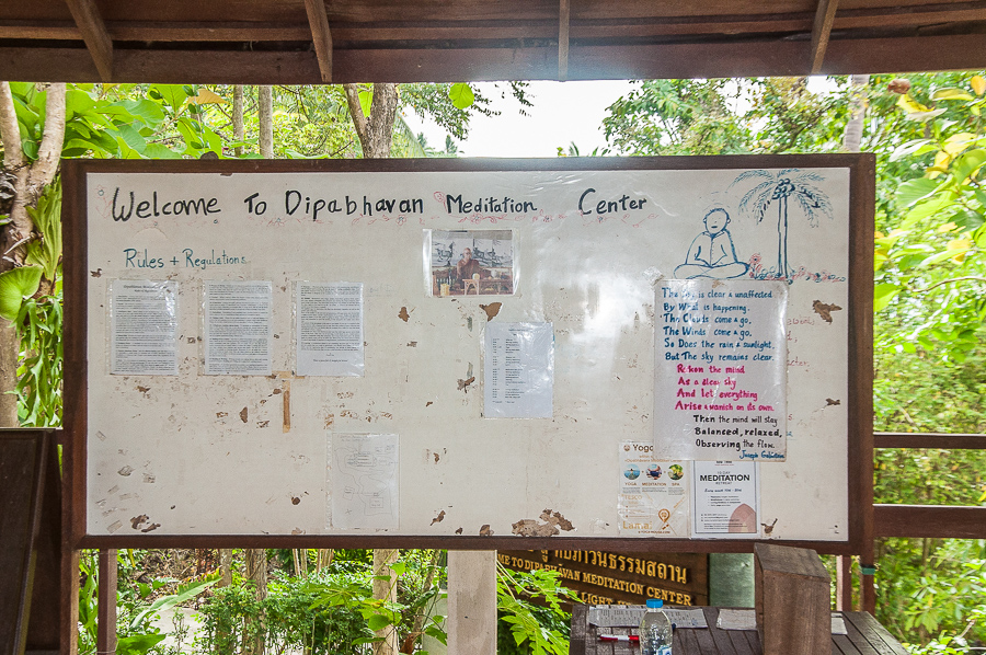 The Dipabhavan noticeboard in the dining hall that contained daily Buddhist quotes and the 'rules' of the retreat.